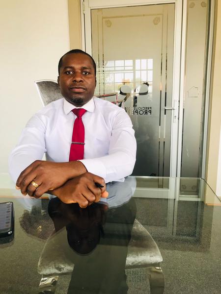 Collins Mordi, estate agent