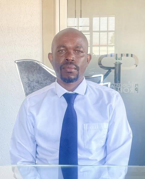 John Aganze, estate agent