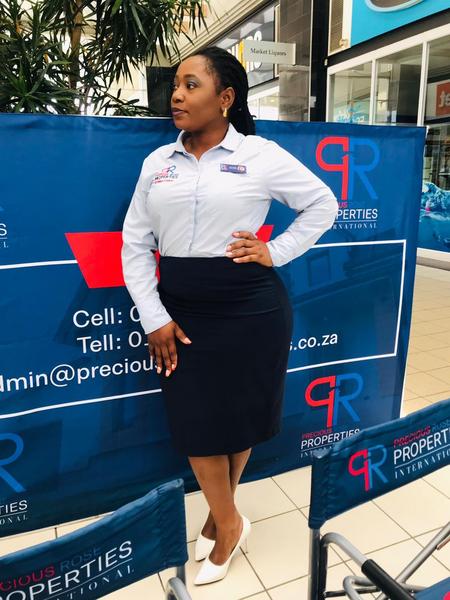 Lizzy Saveko, estate agent